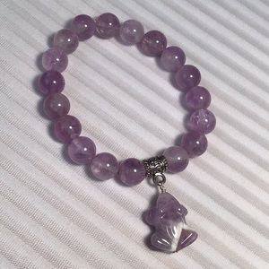 Genuine Amethyst stones with an Amethyst Frog